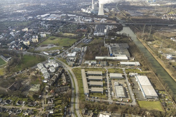 Aerial view, industrial area at the Rhine-Herne Canal Westring / Bahnhohstraße with Bofrost / bush Jäger / Logiball / LSBit, company for mechanical engineering Sinterwerke, in the background Steag Heizkrftwerk, Seniorcampus Herne - Protea wohnen am Schloss, Herne, Ruhr area, North Rhine-Westphalia, Germany, DE, Europe, birds-eyes, view, aerial view, aerial photography, aerial photography, overview, overview, bird's eye view, industry, trade, economy, business, production, trade, living, in, old age, retirement home, nursing home, energy, wind energy, power plant, electricity, power supply, electricity, power generation, power production