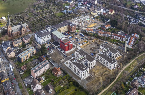 Aerial view, health campus, senior centre Widumer Höfe, on the campus of the St.Elisabeth Group, at the Marienhospital-Herne II and nursing school, next to the Catholic Church St.Peter and Paul and, construction site new residential complex Widumer Quartier, in Sodingen in Herne, Ruhr area, North Rhine-Westphalia, Germany, Herne, DE, Europe, birds-eyes, view, aerial view, aerial photography, aerial photography, overview, overview, bird's eye view, living, in, old age, retirement home, nursing home, health, care, doctors, medicine, surgery, therapy, house of God, religion, faith, worship, mass