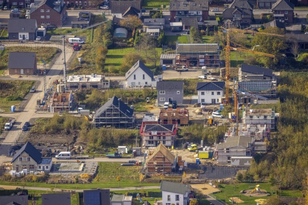 Aerial view, residential park Schulze-Everding, new construction area, Bockum-Hövel, Hamm, Ruhr area, North Rhine-Westphalia, Germany, Am Eversbach, construction work, construction vehicles, construction area, construction site, building plots, construction project, construction site, DE, development, Europe, capacity requirements, aerial view, aerial photography, aerial photography, new construction, overview, bird's eye view, meadows and fields, bird's eye view, overview