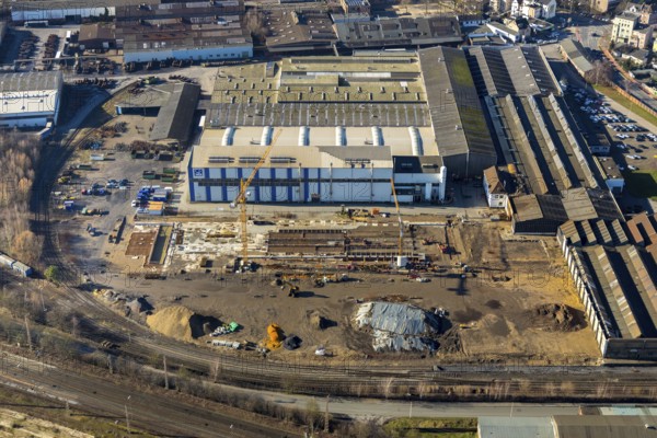Aerial view, new construction, WDI Westfälische Drahtindustrie AG, Hamm, Ruhr area, North Rhine-Westphalia, Germany, construction work, construction, construction area, construction site, construction crane, construction measure, construction project, construction site, DE, development, Europe, commercial area, commercial use, industrial plants, industrial area, industrial site, capacity requirement, aerial view, aerial photography, aerial photography, new construction, production plants, production halls, overview, bird's eye view, Wilhelmstrasse, birds-eyes view, overview