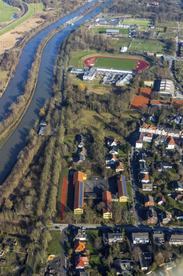 Aerial photograph, Theodor-Heuss-Schule, Jahnstadion, Ambulante Reha Bad Hamm GmbH, Arthur-Dewitz-Straße, River Lippe, Datteln-Hamm-Canal, Bad Hamm, Hamm, Ruhr area, North Rhine-Westphalia, Germany, education, educational institution, Brändströmstraße, DE, Europe, football pitch, primary school, teaching institute, aerial view, aerial photography, aerial photography, medical facility, medical aid, photovoltaics, school, solar, solar plant, solar energy, solar energy, sports, sports facilities, sports field, stadium, overview, bird's-eye view, birds-eyes view, overview, medical care