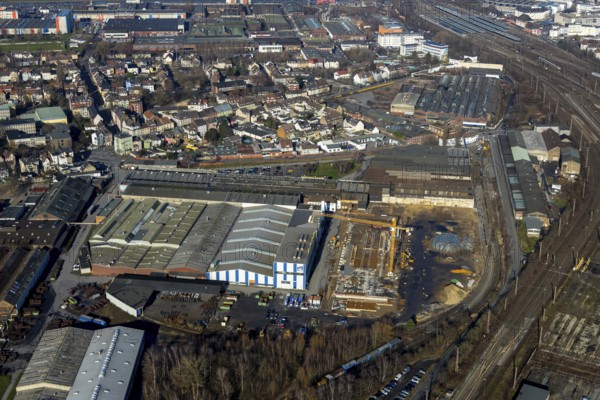 Aerial view, new construction Wilhelmstraße, WDI Westfälische Drahtindustrie AG, Hamm, Ruhr area, North Rhine-Westphalia, Germany, construction work, construction, construction area, construction site, construction crane, construction measure, construction project, construction site, DE, development, Europe, commercial area, commercial use, industrial plants, industrial area, industrial site, capacity requirement, aerial view, aerial photography, aerial photography, new construction, production plants, production halls, overview, bird's eye view, Wilhelmstraße, birds-eyes view, overview