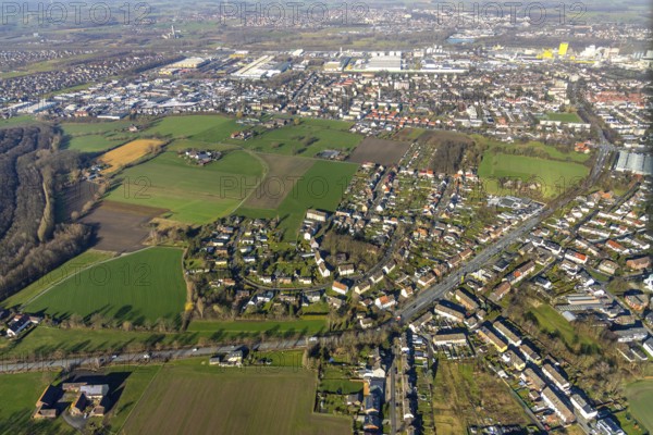 Aerial view, residential area Stresemannstraße, Kamener Straße, district Daberg, industrial area at the Datteln-Hamm canal, Hamm, Ruhr area, North Rhine-Westphalia, Germany, DE, Europe, distant view, commercial area, property tax, real estate, industrial facilities, industrial area, industrial site, aerial view, aerial photography, aerial photography, overview, bird's eye view, residential area, living and working, living and life, residential area, residential buildings, birds-eyes view, overview