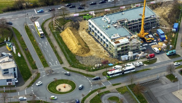 Aerial view, construction site new building Sparkasse Hamm, Rhynerberg Werler Straße, Hamm, Ruhr area, North Rhine-Westphalia, Germany, construction work, construction area, construction site, building plots, construction crane, construction measure, construction project, construction site, DE, development, Europe, commercial buildings, capacity requirement, roundabout, aerial view, aerial photography, aerial photography, new building, overview, bird's eye view, birds-eyes view, overview
