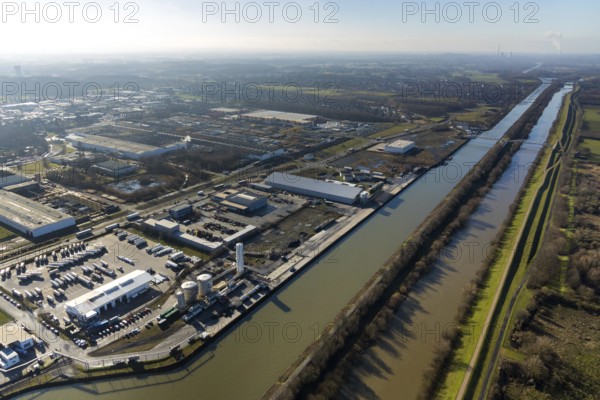Aerial view, industrial area harbour Hamm between Hugo Schneider GmbH and Lanfer, Datteln-Hamm canal, river Lippe, Lippepark, bridge building in Lippepark, Hamm, Ruhr area, North Rhine-Westphalia, Germany, bridge, DE, Europe, river, river course, commercial area, commercial park, commercial use, industrial plants, industrial area, industrial site, canal, Lippe bridge, aerial view, aerial photography, aerial photography, production plants, production halls, overview, bird's eye view, birds-eyes view, overview
