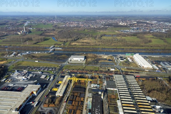 Aerial view, industrial area harbour Hamm between Hugo Schneider GmbH and Lanfer, Datteln-Hamm canal, river Lippe, Lippepark, bridge building in Lippepark, Hamm, Ruhr area, North Rhine-Westphalia, Germany, bridge, DE, Europe, river, river course, commercial area, commercial park, commercial use, industrial plants, industrial area, industrial site, canal, Lippe bridge, aerial view, aerial photography, aerial photography, production plants, production halls, overview, bird's eye view, birds-eyes view, overview