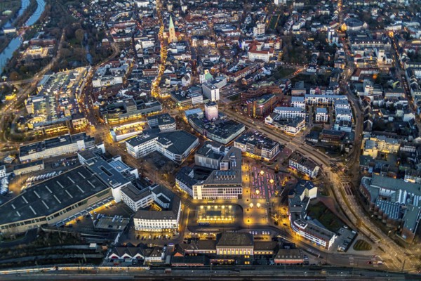Aerial view, overview of Hamm at night, technical town hall, station forecourt, Alleecenter ECE, Luther church in the Luther quarter, Bockum-Hövel, Hamm, Ruhr area, North Rhine-Westphalia, Germany, DE, Europe, birds-eyes view, aerial view, aerial photography, aerial photography, overview, bird's eye view, night view, twilight shot, Hamm at night