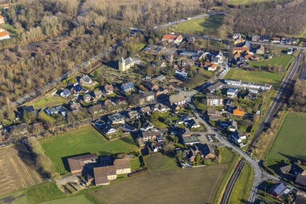 Aerial view, local view Uentriop, Uentrop village church, Maximilian primary school Uentrop, Uentrop, Hamm, Ruhr area, North Rhine-Westphalia, Germany, An der Uentroper Kirche, burial place, education, educational institution, DE, Europe, cemetery, memorial, religious community, place of worship, place of worship, primary school, land tax, graves, burial ground, real estate, church, parish, denomination, teaching institute, aerial view, aerial photography, aerial photography, religion, resting place, school, overview, bird's-eye view, living and life, residential area, residential buildings, housing estate, birds-eyes view, overview
