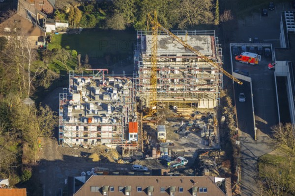 Aerial view, St. Josef Hospital, new building, construction company Heckmann, former kindergarten, Hamm, Ruhr area, North Rhine-Westphalia, Germany, construction work, construction area, construction site, building plots, construction crane, construction project, construction site, DE, development, Europe, healthcare, hospital, capacity requirements, clinic, clinic centre, hospital, aerial view, aerial photography, aerial photography, medical facility, medical aid, new building, emergency service, overview, bird's eye view, birds-eyes view, overview, medical care
