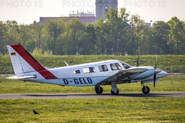 Aerial view, twin-engine aircraft with the registration D-GELD, Hamm-Lippewiesen airfield EDLH, runway markings, Lippe river, Lippe conversion, Hamm, Ruhr area, North Rhine-Westphalia, Germany, Europe, birds-eyes view, aerial photograph, aerial photography, aerial photography, overview, bird's eye view