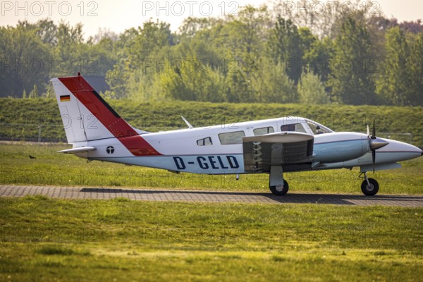 Aerial view, twin-engine aircraft with the registration D-GELD, Hamm-Lippewiesen airfield EDLH, runway markings, Lippe river, Lippe conversion, Hamm, Ruhr area, North Rhine-Westphalia, Germany, Europe, birds-eyes view, aerial photograph, aerial photography, aerial photography, overview, bird's eye view