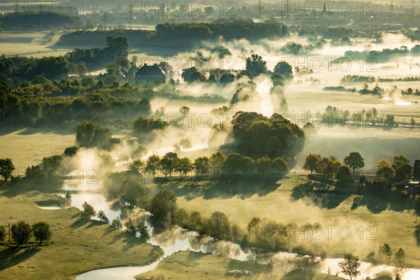 Aerial view, morning fog, Lippe river floodplain, landscape in backlight, Oberwerries Castle, Hamm, Ruhr area, North Rhine-Westphalia, Germany, ground fog, DE, Europe, river Lippe, river floodplain, backlight, green trees, landscape, aerial view, aerial photography, aerial photography, fog, overview, bird's eye view, meadows and fields, birds-eyes view, overview