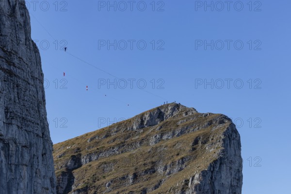 Tour d'Aï and Tour de Mayen with tightrope artist, Leysin, Vaud, Switzerland