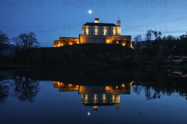 Moon over Trautenfels Castle, reflection in a lake, blue hour, near Irdning, Ennstal, Styria, Austria