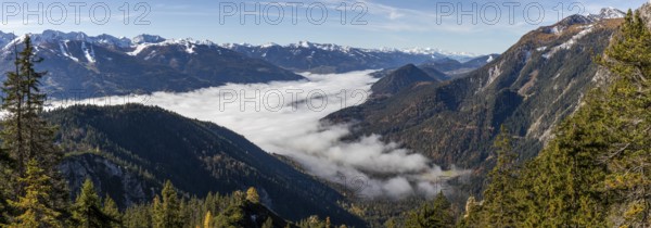 Autumn atmosphere, fog over the Enns Valley, snow on alpine mountain range, autumn leaves, panoramic view from Stoderstraße, near Gröbming, Styria, Austria