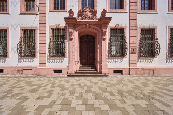Erthaler Hof, Adelshof, classicism style, entrance area, façade with windows, doors and latticing, concrete paving stone walkway, sunny, street Schillerstraße, Mainz, state capital, district-free city, Rhineland-Palatinate, Germany