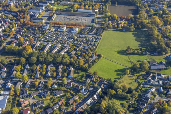 Aerial view, Huckenholz residential area, above, Hamm Federal Administration Office and Main Customs Office, Central Accommodation for Refugees (CÜ), Sankt-Georgs-Platz, Üntrop, Hamm, Ruhr area, North Rhine-Westphalia, Germany, authority, trees in autumn colors, DE, Europe, refugee village, refugee camp, refugee accommodation, refugee accommodation, property tax, autumn, autumn colors, autumn colors, autumn mood, real estate, aerial photography, aerial photography, overview, bird's eye view, residential complex, living and living, residential area, residential quality, residential district, residential district, birds-eyes view, autumn trees, overview