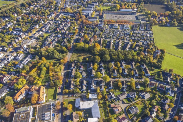 Aerial view, Hamm Federal Administration Office and Main Customs Office, Central Accommodation Facility for Refugees (ZÜ), Sankt-Georgs-Platz, Huckenholz residential area, Uentrop, Hamm, Ruhr area, North Rhine-Westphalia, Germany, authority, trees in autumn colors, DE, Europe, refugee village, refugee camp, refugee accommodation, refugee accommodation, property tax, autumn, autumn colors, autumn colors, autumn atmosphere, real estate, aerial view, aerial photography, aerial photography, overview, bird's eye view, residential complex, living and residential area, quality of living, residential district, residential area, birds-eyes view, autumn trees, overview