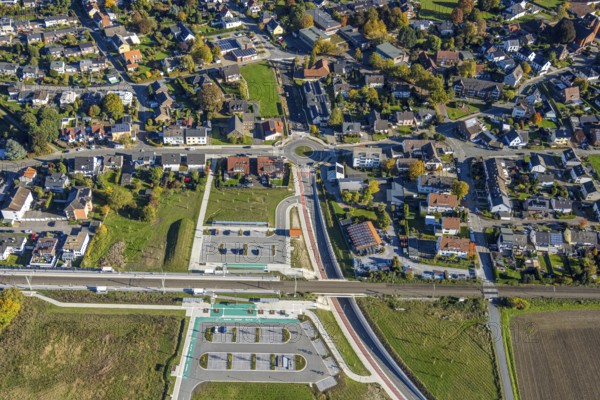 Aerial view, Westtünnen station on Südfeldweg and Von-Thünen-Straße for the future railway station, new Von-Thünen-Straße roundabout, railway line with railway bridge, Rhynern district, Hamm, Ruhr area, North Rhine-Westphalia, Germany, construction site, building plot, construction project, construction site, DE, Europe, large construction site, aerial photography, aerial photography, new building, overview, bird's eye view, birds-eyes view, overview