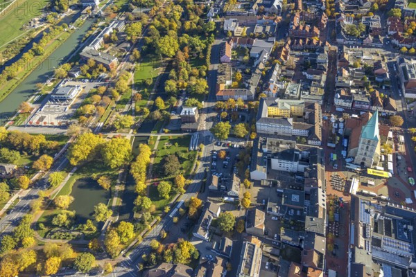 Aerial view, city and evangelical St. Paul's Church and educational center, weekly market market on the market square, Hammonense grammar school and water sports center, Nordringpark with autumn trees, Mitte, Hamm, Ruhr area, North Rhine-Westphalia, Germany, place of worship, education, educational institution, city, DE, Europe, religious community, church, church, religious community, denomination, teaching institute, aerial view, Photography, Aerial Photography, Religion, Religious Place of Worship, School, Sports Center, Overview, Bird's Eye View, birds-eyes View, overview