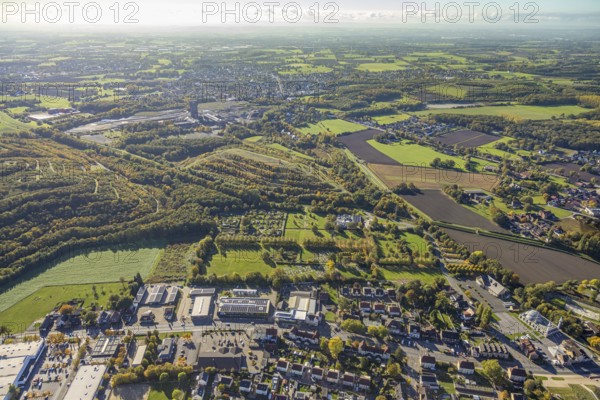 Aerial view, Herringen park cemetery and crematorium Hamm GmbH, Lippepark barefoot trail, Humbert heap and Hammerkopf tower, autumn trees, Herringen district, Hamm, Ruhr area, North Rhine-Westphalia, Germany, burial place, mountain holding, DE, Europe, cemetery, memorial, Gottesacker, graves, burial ground, aerial photo, aerial photography, resting place Table, overview, bird's eye view, overview