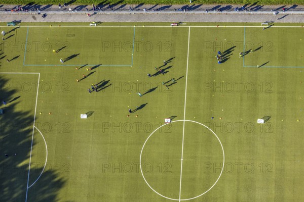 Aerial view, soccer stadium sports ground TuS 1910 Wiesergofen, young people training, vertical photo and shadow casting, Pelcum district, Hamm, Ruhr area, North Rhine-Westphalia, Germany, DE, Europe, soccer field, soccer stadium, aerial photography, aerial photography, sports complex, sports field, overview, birds-eyes view, overview