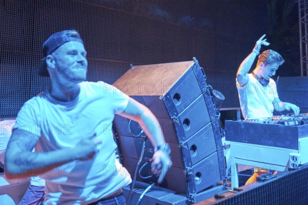 EDITORIAL and NEWS ONLY, MC Tjen next to DJ Ravitez (Chico de Reus) at Starbeach events festival Hersonissos, Crete, Greece, on 17. July 2017, performing shortly before Hardwell and Afrojack