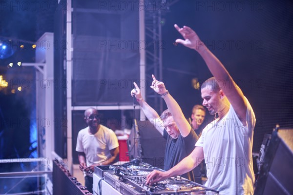 EDITORIAL and NEWS ONLY, rare moment of joint DJ back to back performance of edm dance music DJ Afrojack performing with DJ Hardwell on DJ pult at Starbeach events festival Hersonissos, Crete, Greece, on 17. July 2017