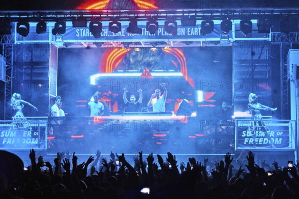 EDITORIAL and NEWS ONLY, stage view of rare moment of joint DJ back to back performance of edm dance music DJ Afrojack performing with DJ Hardwell on DJ pult at Starbeach events festival Hersonissos, Crete, Greece, on 17. July 2017