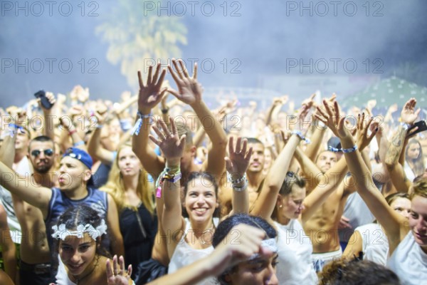 EDITORIAL and NEWS ONLY, festival crowd cheering towards stage of rare moment of joint DJ back to back performance of edm dance music DJ Afrojack performing with DJ Hardwell on DJ pult at Starbeach events festival Hersonissos, Crete, Greece, on 17. July 2017