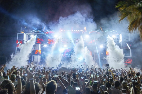 EDITORIAL and NEWS ONLY, CO2 machine cannon at edm performance, stage view of rare moment of joint DJ back to back performance of edm dance music DJ Afrojack performing with DJ Hardwell on DJ pult at Starbeach events festival Hersonissos, Crete, Greece, on 17. July 2017