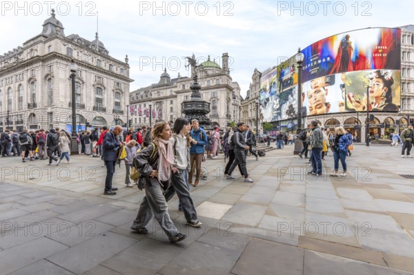 London, United Kingdom - 15 May 2025: Tourists and local walking on Piccadilly Circus