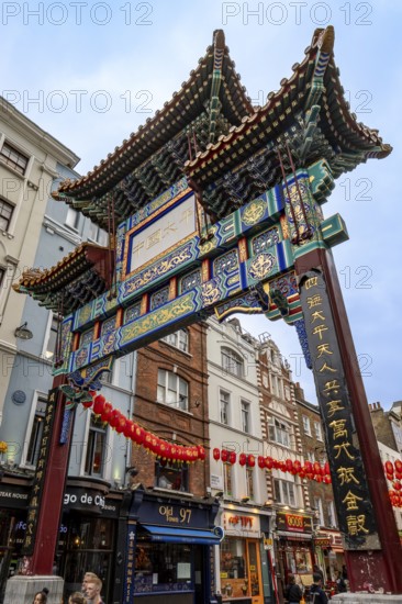 London, United Kingdom - 15 May 2025: Ornate and colorful traditional chinese gate marking the entrance to London's chinatown