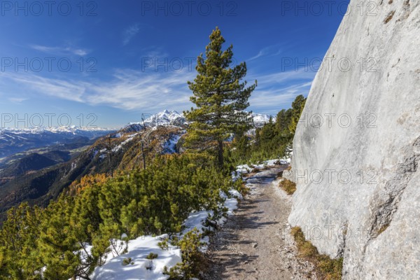 Autumn atmosphere, snow on mountain range, autumn leaves, path to Friedenskircherl, view from Stoderzinken near Gröbming, Styria, Austria