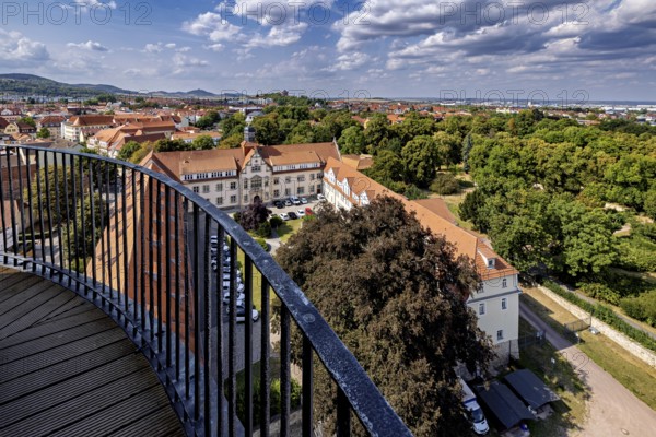 Extensive view of the city with buildings, trees and blue sky, the old town of Arnstadt in Thuringia