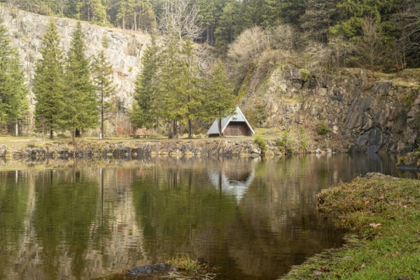 A hut reflected in calm water, Erfurt, Thuringia, Germany