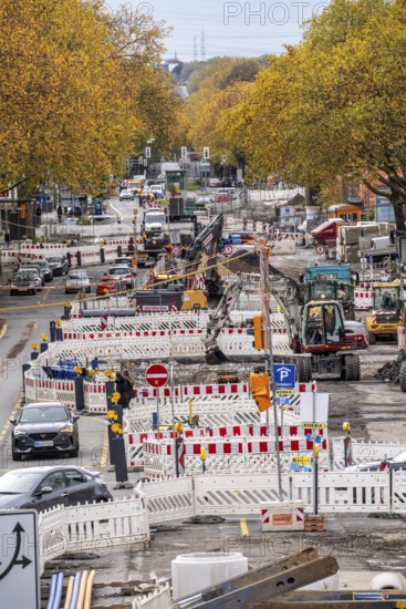 Large-scale construction site on Alleestrasse in downtown Bochum, road construction, construction of new cycle lanes, sidewalks, road surfaces, renewal of canals and water collection systems, trenches, for rainwater, greening, sustainable and modern road conversion, North Rhine-Westphalia, Germany