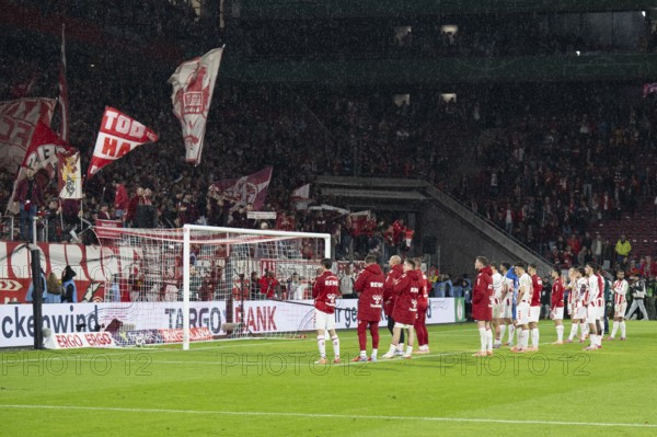 (DFL/DFB REGULATIONS PROHIBIT ANY USE OF PHOTOGRAPHS AS IMAGE SEQUENCES AND/OR QUASI-VIDEO), Rhein Energie Stadion, Cologne, North Rhine-Westphalia, FC Team ahead of the South Curve, DFB-Pokal 1.FC Cologne, FC Bayern Munich on 29.10.2025 at the Rhein Energie Stadium in Cologne Germany