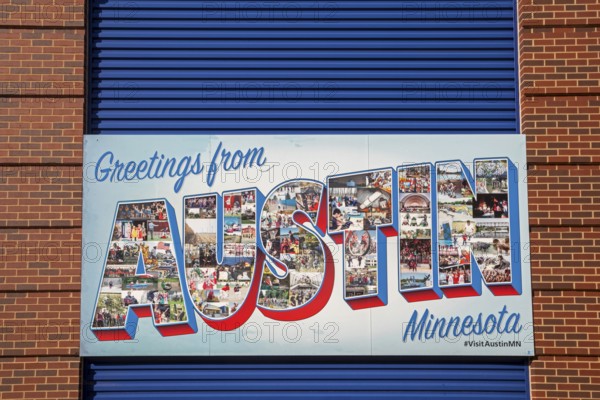 Austin, Minnesota - A 'Greetings from Austin' sign onthe side of the SPAM Museum. SPAM is a lunch meat made of pork and ham, canned by Hormel Foods. Hormel is headquartered in Austin