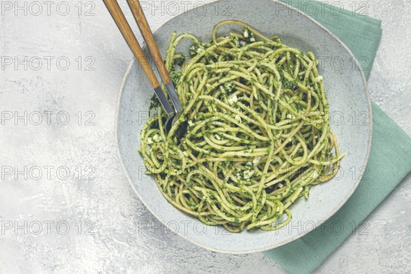 Spaghetti with pesto sauce, homemade, no people