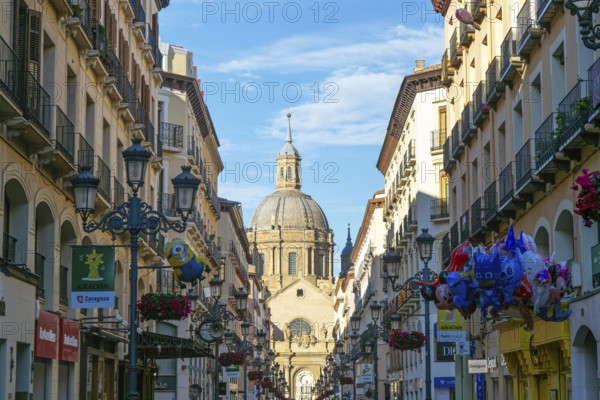 View of Basilica of Our Lady of the Pillar cathedral church from Calle de Alfonso I, Zaragoza, Aragon, Spain