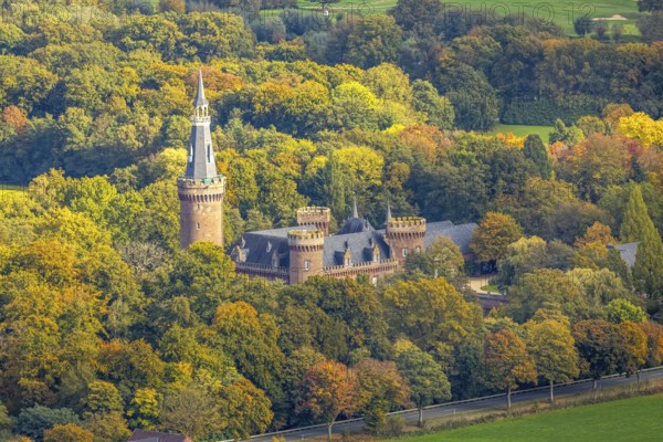 Aerial view, Moyland Castle Museum, neo-Gothic moated castle and castle park surrounded by meadows and fields and autumn forest, tourist destination on the Lower Rhine, Moyland, Bedburg-Hau, Lower Rhine, North Rhine-Westphalia, Germany
