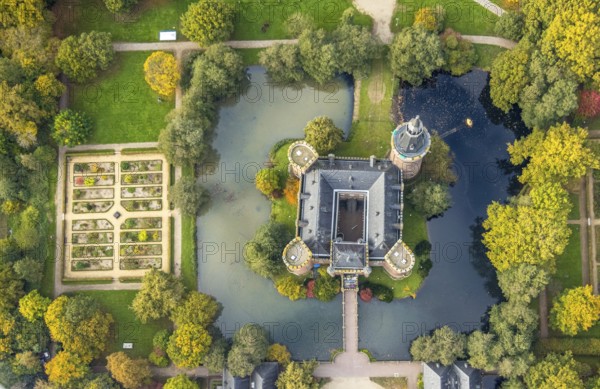 Aerial view, Moyland Castle Museum, neo-Gothic moated castle and castle park with herb garden surrounded by meadows and fields and autumn forest, tourist destination on the Lower Rhine, Moyland, Bedburg-Hau, Lower Rhine, North Rhine-Westphalia, Germany