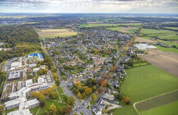 Aerial view, residential area view, Kleve vocational college and blue basketball court, Gocher Landstraße Bundesstraße B9 with autumnal tree-lined avenue, distant view, Weißes Tor, Bedburg-Hau, Lower Rhine, North Rhine-Westphalia, Germany