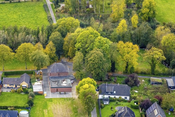 Aerial view, Hommersum-Huyskensstraße border crossing, Regina Evers restaurant, autumn trees, Hommersum, Goch, Lower Rhine, North Rhine-Westphalia, Germany, trees in autumn colors, DE, Europe, border crossing point, guest, autumn colors, autumn mood, autumn forest colors, aerial photography, overview, bird's eye view, birds-eyes view, autumn tree avenue, overview