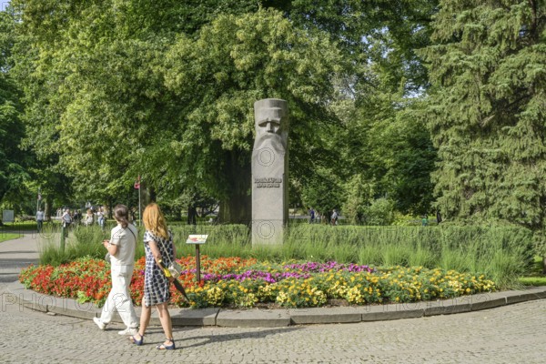 People, leisure, memorial writer Krisjanis Barons, municipal park, Riga, Latvia