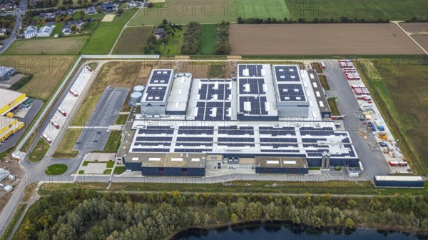 Aerial view, Tricor factory packaging company, Weeze, Lower Rhine, North Rhine-Westphalia, Germany, DE, roof with solar panels, Europe, commercial property, commercial property, commercial location, commercial use, Goch, industrial location, aerial photography, aerial photography, photovoltaic system, solar system, solar roof, solar energy, solar panels, solar power system, overview, bird's eye view, birds eyes view, overview