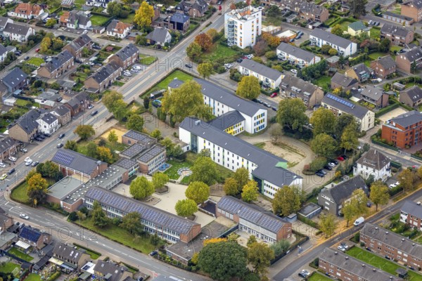 Aerial view, Kleve vocational college in the Kleve district Goch school town, Arnold Janssen school, child day care treasure chest U3 care, solar roof, Goch, Lower Rhine, North Rhine-Westphalia, Germany, vocational school, education, educational institution, DE, roof with solar panels, Europe, elementary school, teaching institute, aerial photography, aerial photography, photovoltaic system, school, solar system, solar energy, solar panels, solar power system, overview, bird's eye view, birds-eyes view, overview
