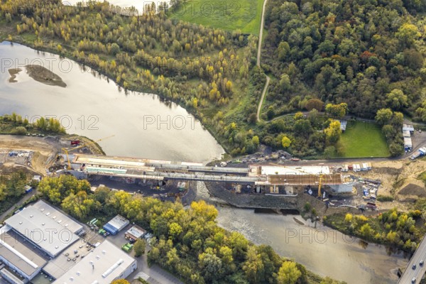 Aerial view, Lippe bridge construction site, new bridge over the river Lippe to connect to the federal road B58 and Lower Rhine bridge Wesel, Wesel, Lower Rhine, North Rhine-Westphalia, Germany, construction area, building plot, construction project, construction project, construction site, trees in autumn colors, DE, Europe, autumn, autumn colors, autumn mood, autumn forest colors, aerial photography, aerial photography, new building, overview, bird's eye view, birds-eyes view, autumn trees, overview