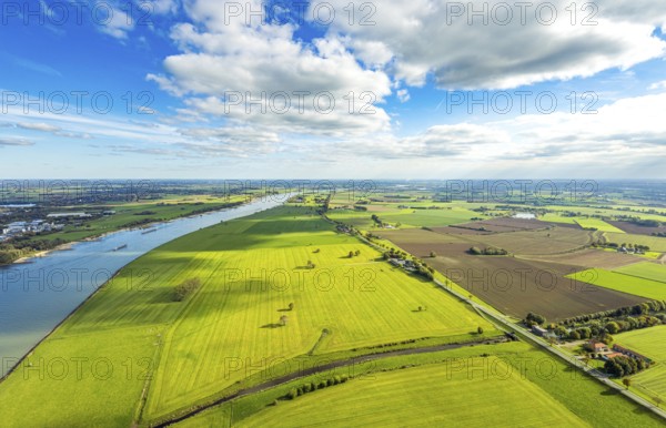 Aerial view, Rhine river with dyke foothills near Grieth LSG landscape protection area, Rheinaue meadows and fields and blue sky with clouds, Hurendeich, Kleve, Lower Rhine, North Rhine-Westphalia, Germany, DE, Europe, river, floodplain, Kalkar, aerial photography, overview, bird's eye view, meadows and fields, birds-eyes view, overview